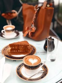 Close-up of coffee served on table