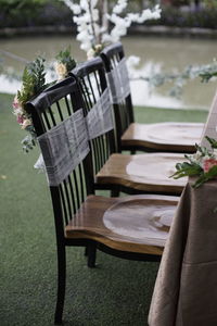 Close-up of empty chair on table