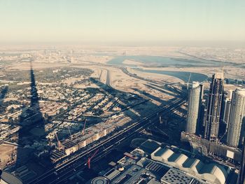 High angle view of buildings in city against sky