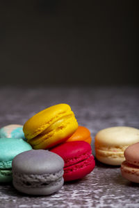 Close-up of multi colored candies on table