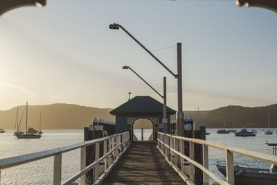 Pier over sea against sky