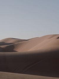 Scenic view of desert against clear sky