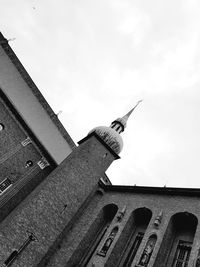 Low angle view of roof against sky in city