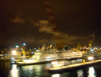 River passing through city at night