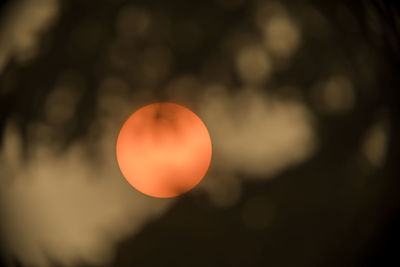 Orange sun in sky