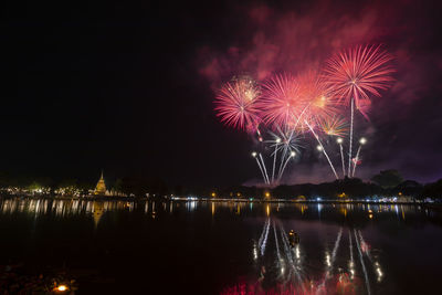 Beautiful fireworks in loi krathong festival at sukhothai historical park thailand.