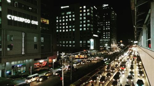 High angle view of traffic on city street at night