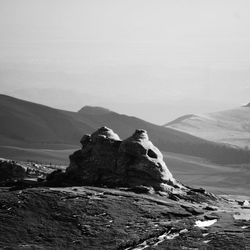 Rock formations on mountain against sky