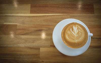 Coffee cup on table