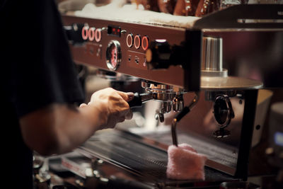 Man working with coffee in cafe