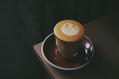 High angle view of cappuccino on table