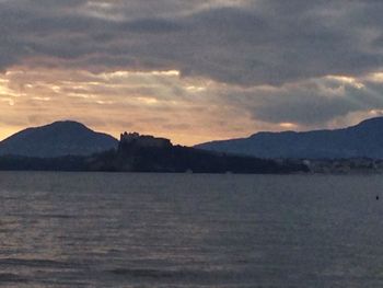 Scenic view of dramatic sky over mountains