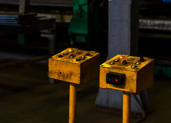 Close-up of old control panels in factory