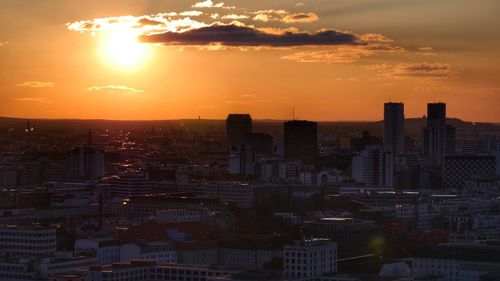 High angle view of buildings against sky during sunset