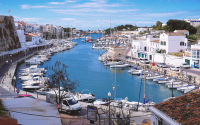 High angle view of harbor by buildings in city