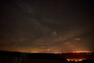 Low angle view of star field against sky at night