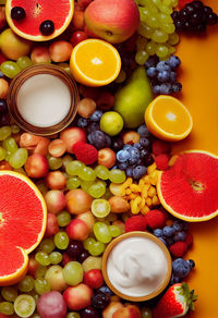 Directly above shot of food on yellow background