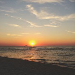 Scenic view of sea at sunset