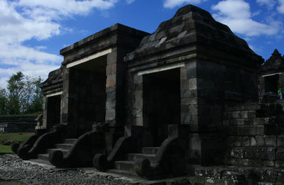 Historical building against cloudy sky