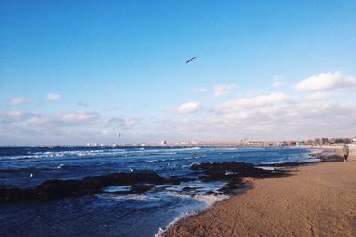 Scenic view of beach against sky