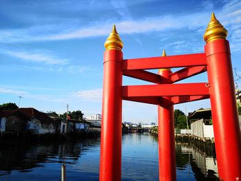 View of bridge over river against buildings