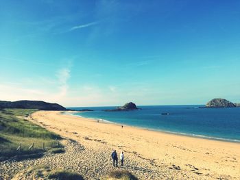 View of beach against blue sky