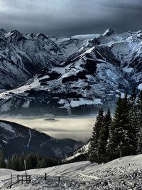 Scenic view of snow covered mountains