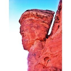 Low angle view of rock formation against clear sky