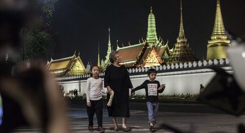 Rear view of people at temple