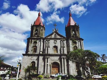 View of historic building against cloudy sky