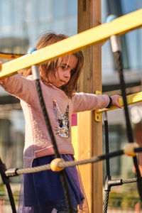 Young girl playing outdoors