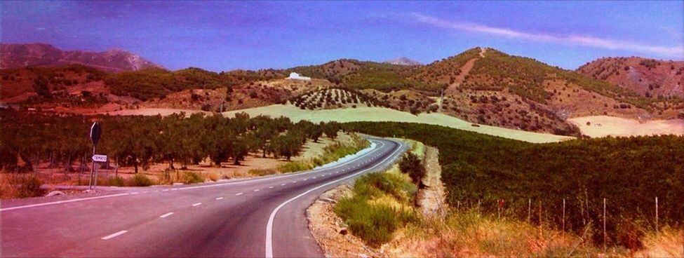 the way forward, road, mountain, transportation, road marking, diminishing perspective, country road, sky, vanishing point, landscape, mountain range, tranquil scene, tranquility, empty road, nature, non-urban scene, scenics, beauty in nature, tree, asphalt