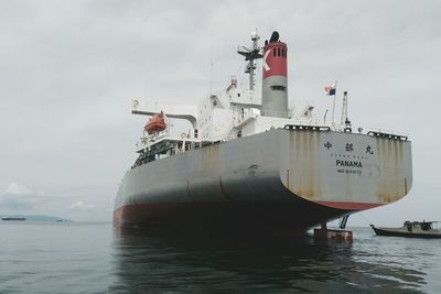 Ship in sea against sky