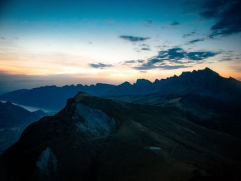 Scenic view of mountains against sky during sunset