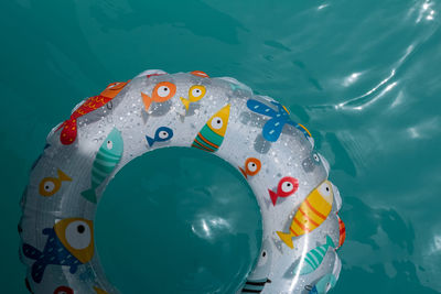 High angle view of inflatable on swimming pool 