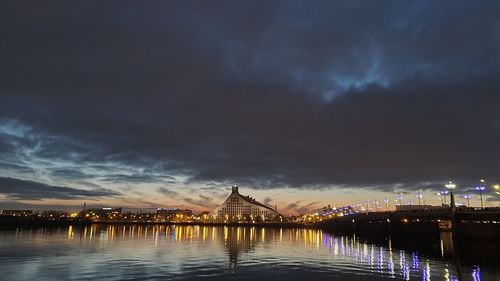 View of illuminated city at waterfront