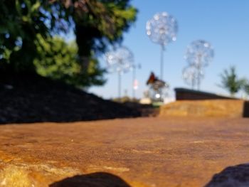 Surface level of road against blue sky