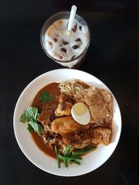 High angle view of breakfast served on table