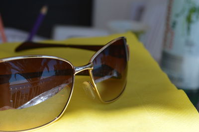 Close-up of sunglasses on table