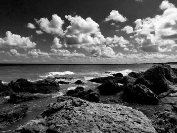 Scenic view of sea against cloudy sky