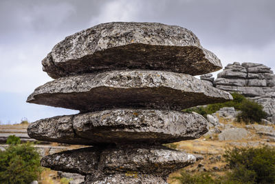 Stack of rocks against sky