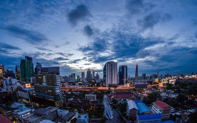 High angle view of buildings in city against sky