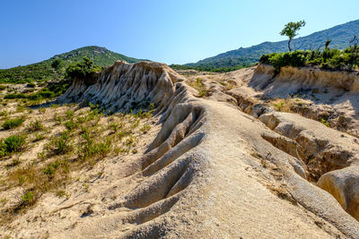 Scenic view of mountains against clear sky