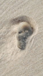 High angle view of shadow on sand