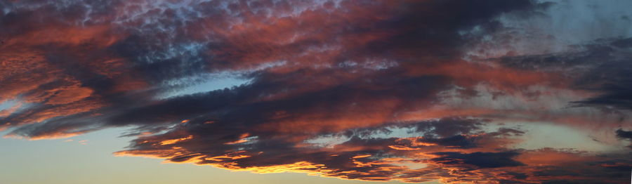 Low angle view of dramatic sky during sunset