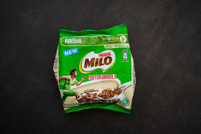 High angle view of information sign on table