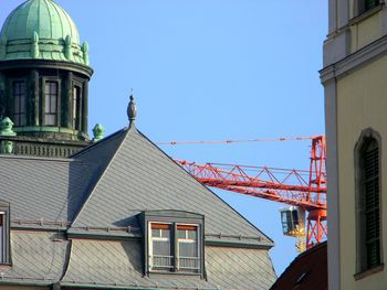 Low angle view of buildings against clear sky