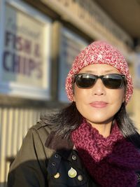 Portrait of woman wearing sunglasses