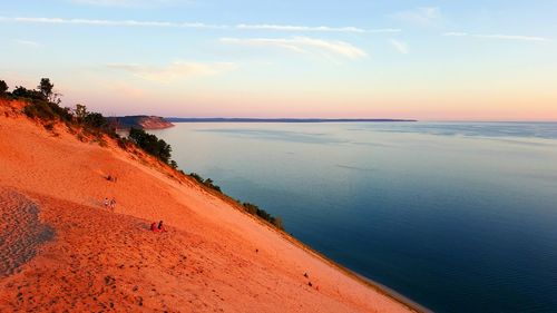 High angle view of people at dune climb by lake michigan