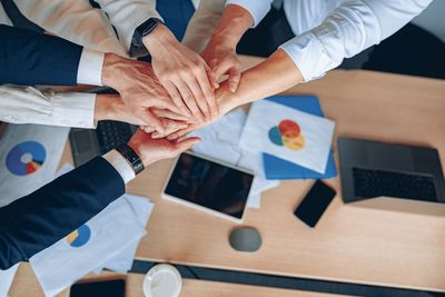 High angle view of business people working on table